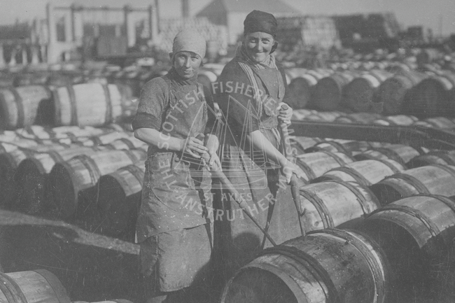 Fisherwomen with barrels