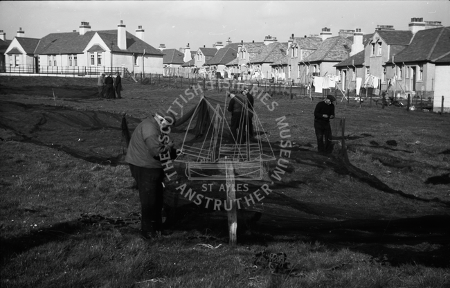 Men mending ring nets, Cellardyke, c.1930s.