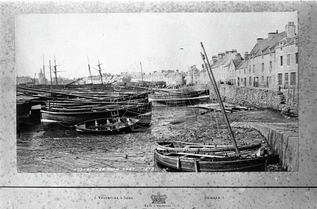 Anstruther harbour with boats at low tide