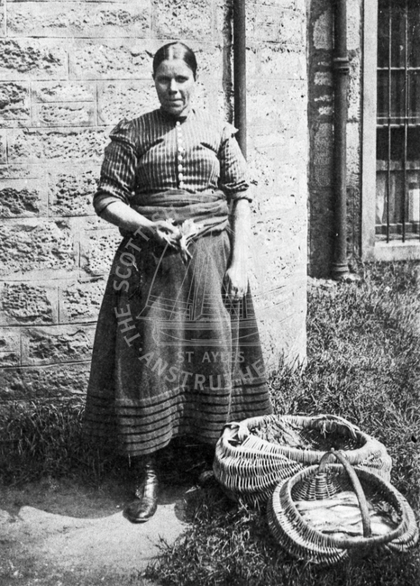 Fishwife with baskets