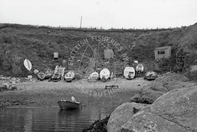 Boats drawn up on shore, south of Aberdeen, 1985