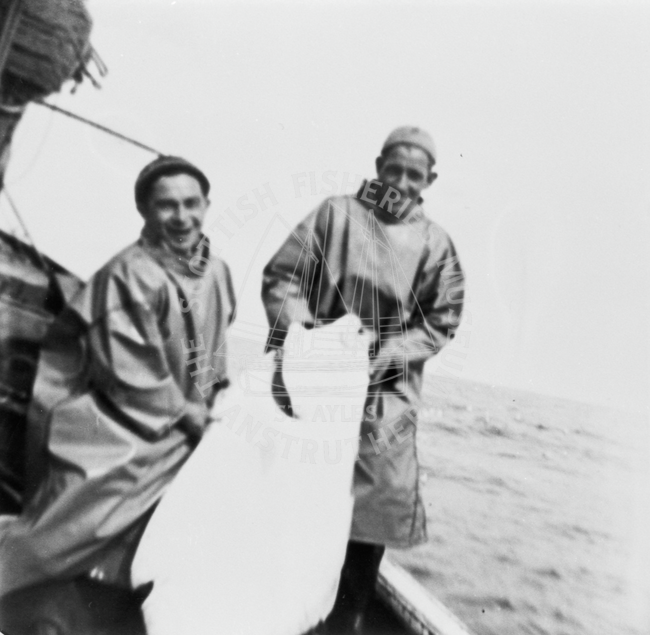 A. Anderson and J. Innes with halibut, 1956.