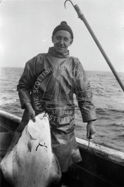 Jackie Taylor with halibut aboard 'Brighter Hope