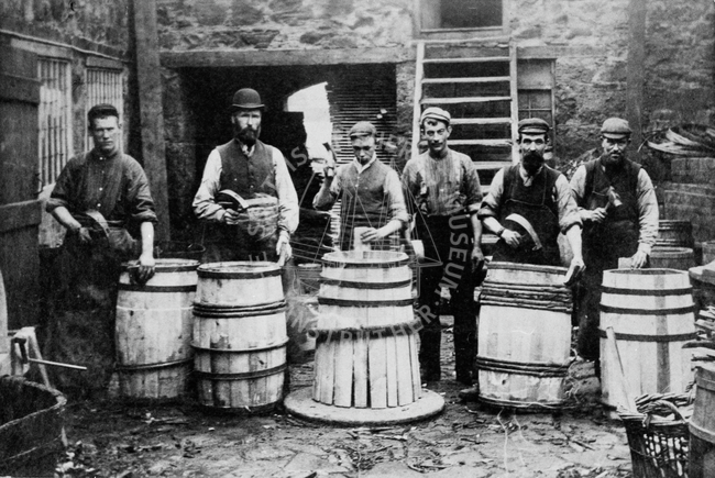 Group portrait of coopers in Cooperage