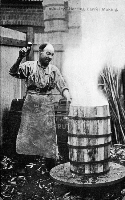 Cooper working on herring barrel, Lowestoft.