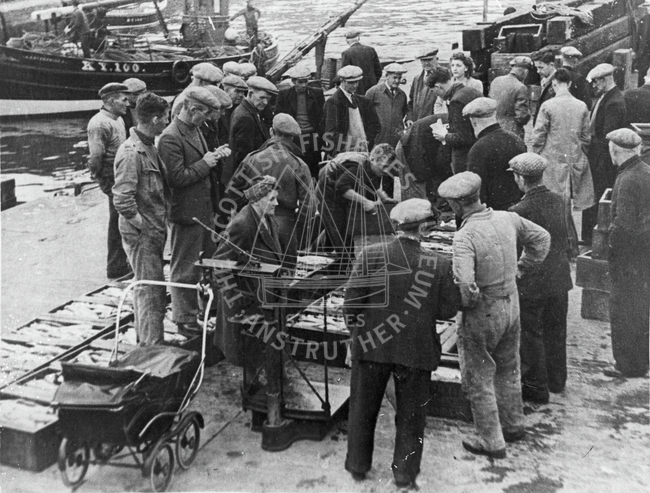 Crowd of people at Fish Market, pre-1950.